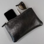 black leather clutch bag