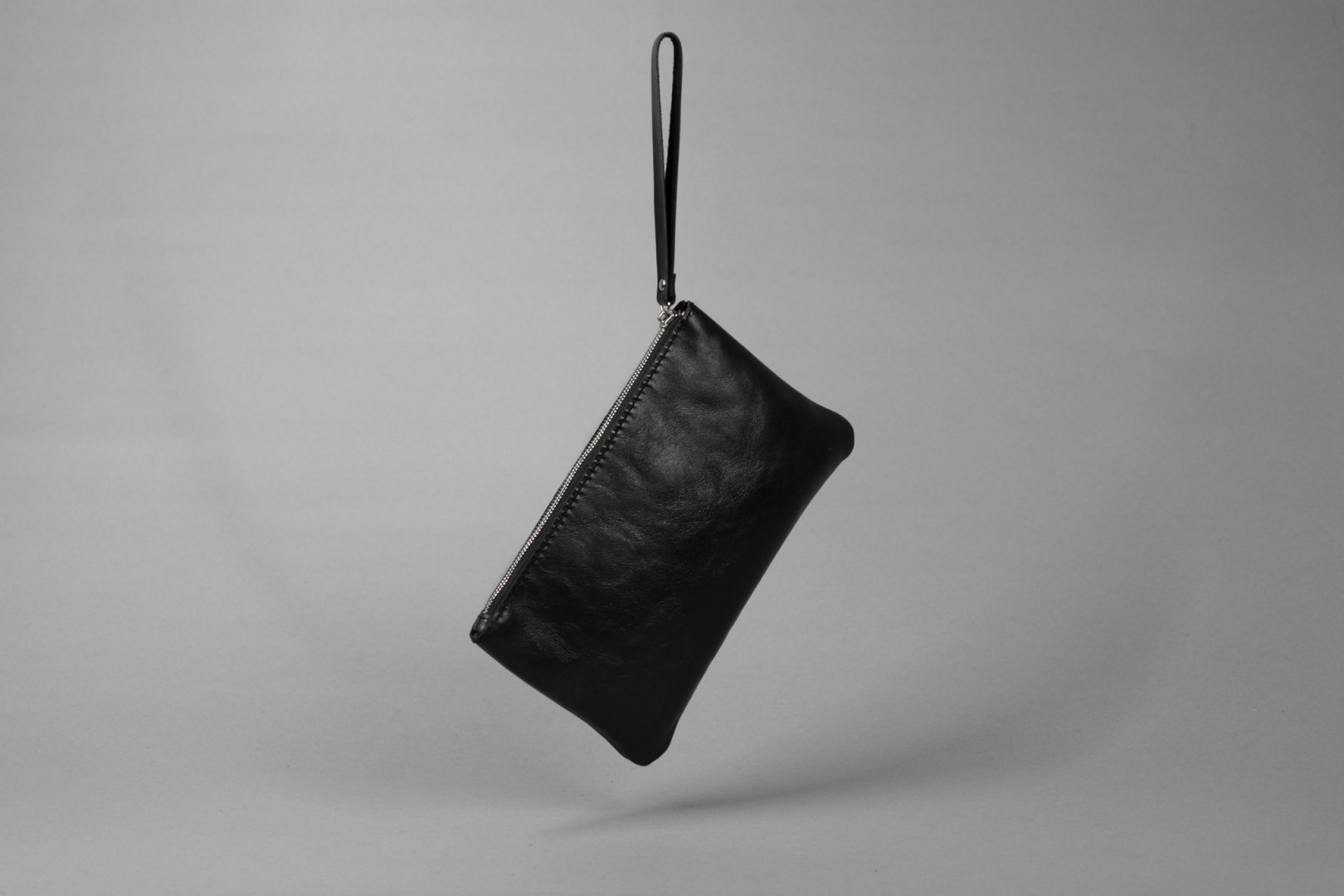 leather wrist bag